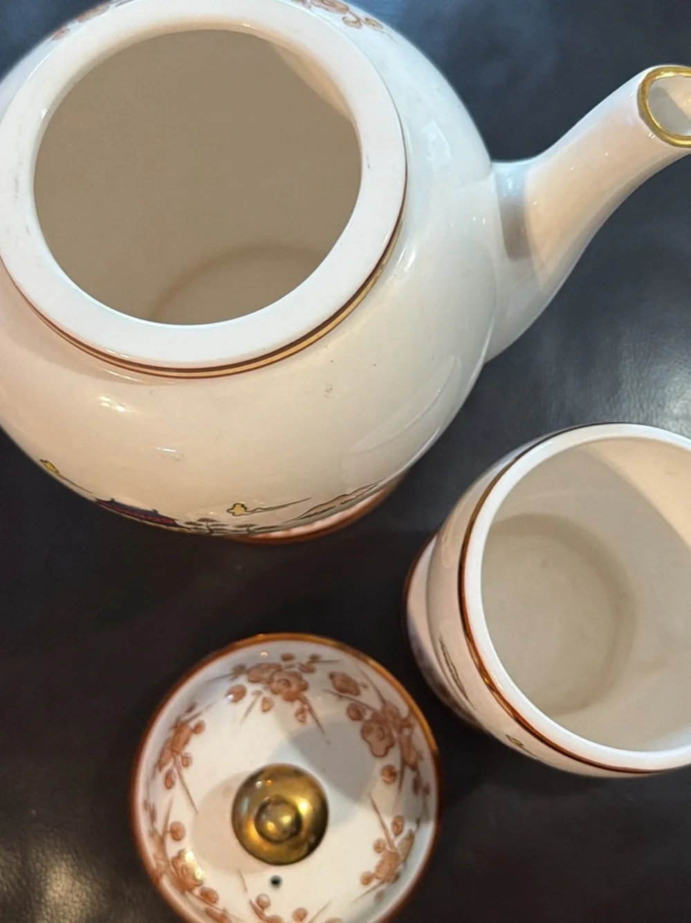 White Ceramic Tea Set with Gold Trim and Oriental Scenic Design